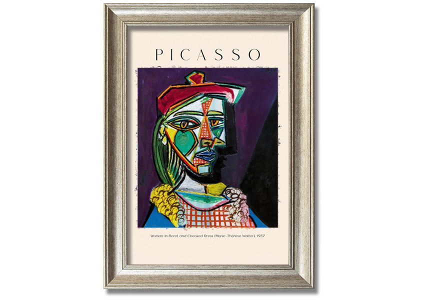 A vibrant reproduction of Picasso's 'Woman In Beret And Checked Dress 1937' printed on canvas, framed and ready to hang.